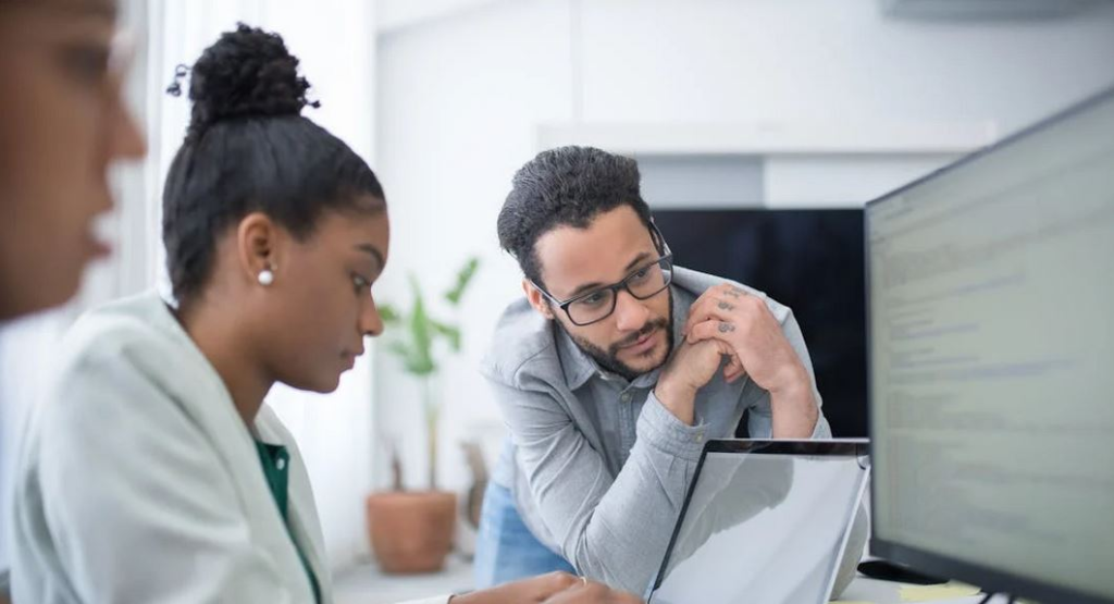 shows a professional mentoring moment—supportive, clear, and intentional